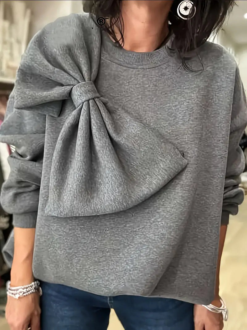 Benia – Stylischer Pullover mit großer Schleife