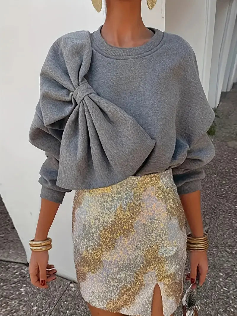 Benia – Stylischer Pullover mit großer Schleife